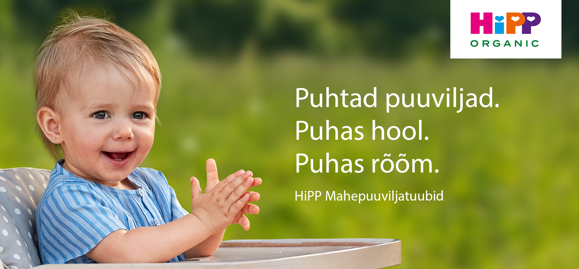 Sinises särgis laps istub toolile rohelisel taustal, millel on tekst "HiPP Organic" ja teistsuguses keeles lause.