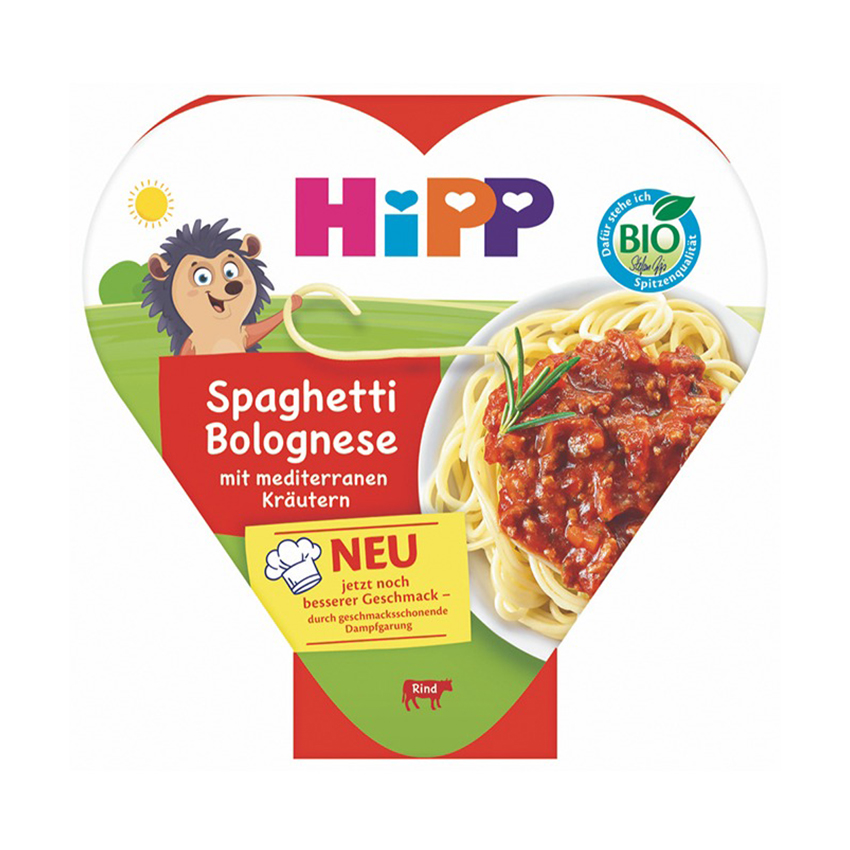 Südamekujulisel toidupakendil on kujutatud karikatuurne siil, taldrik spagetti bolognese ja saksakeelne tekst "Spaghetti Bolognese mit mediterranen Kräutern".